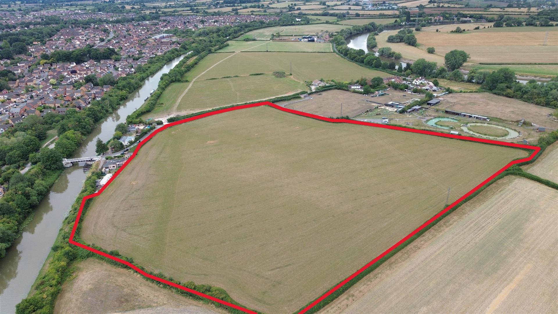 https://mr3.homeflow-assets.co.uk/files/media/image/0000/0000/1b27a1e8a68ce58f92051c5e43b18421/development_land.jpg