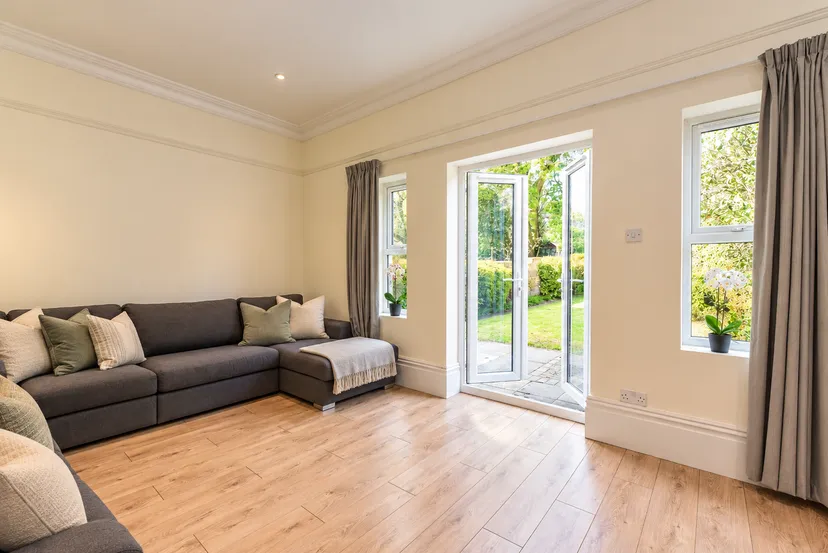 Bright-Neutral-Living-Room-with-Garden-Views.png