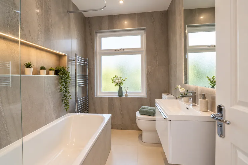 Warm-Modern-Bathroom-with-Greenery.png