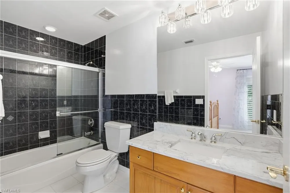 7395 Stonegate Dr, Naples, FL 34109