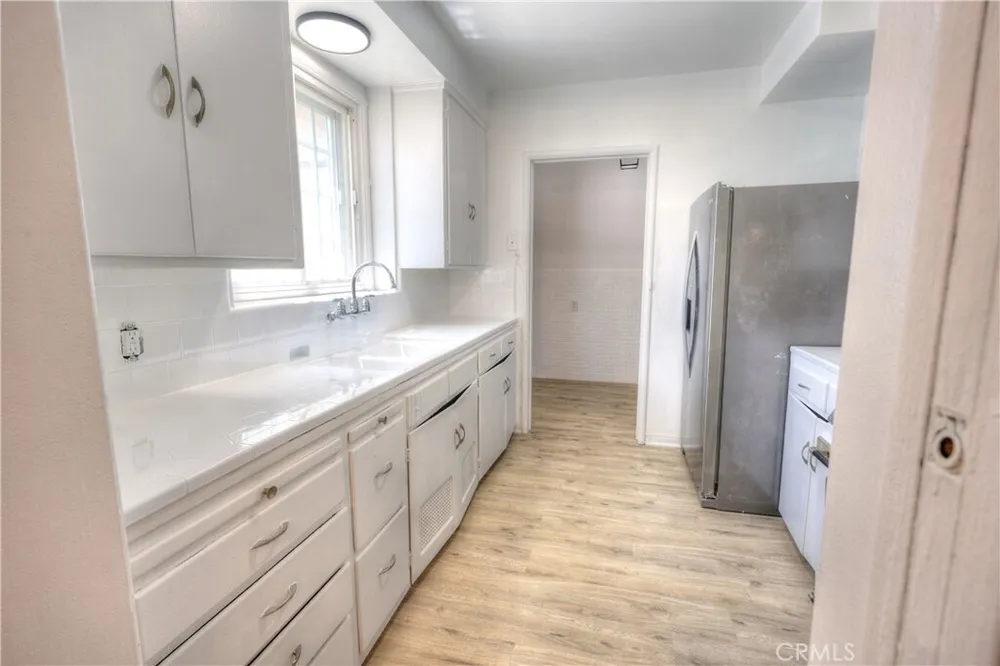 8725 S Gramercy Pl, South Los Angeles, CA 90047